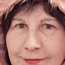 This is what's called devils dust, it's a foam lining used in garments in  the 60s-70s that disintegrated over time into a fine powder. Wear a  respirator when dealing with this, it