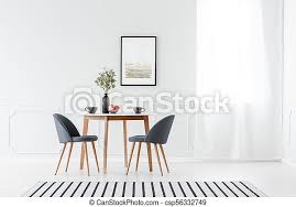 Eat, drink & be merry with a dining table set. Dining Furniture In Minimalist Interior Small Dining Furniture Set And A Striped Rug In A Minimalist White Interior With Art Canstock