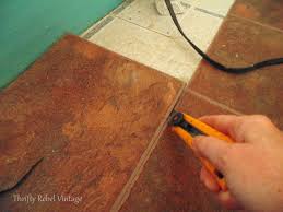 We installed luxury vinyl plank flooring over the concrete in the basement (some new concrete and some old). How To Remove A Vinyl Plank Floating Floor Color Me Thrifty