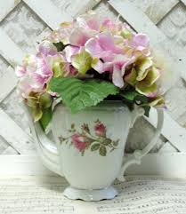 While i did this in black roses, you could use any colors or style of flowers you like. Vintage Pompadour Rose China Tea Pot Floral Centerpiece