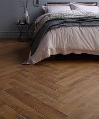 Oakhurst Herringbone Natural Laminate Flooring With Images Herringbone Laminate Flooring Natural Laminate Flooring Laminate Flooring