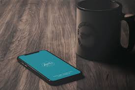 Iphone X Mockup On A Wooden Table Photoshop Mockup Free Wooden Tables Iphone Mockup