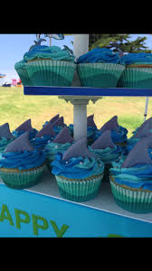Cupcake Decorating Ideas For Boy Birthday Shark Themed 1st Birthday Cupcakes Fondant Shark Fin Cupcake Decorations Cupcakes By Bell Birthday Cupcakes Boy Shark Birthday Party Ocean Birthday Party