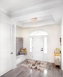 Foyer Tray Ceiling With Beaded Semi Flush Mount Lights And Teal Stools Transitional Entrance Foyer
