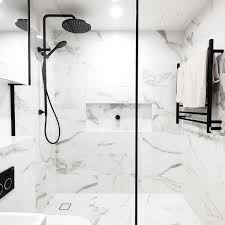 The beige and white veins flow through the. Marble Bathrooms Modern Marble Bathroom Bathroom Goals Black Marble Bathroom