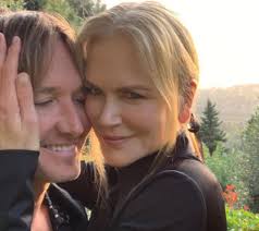 Keith Urban picks up his guitar at home to sing “The Gambler” and nails it