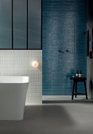 On the walls are white rustic metro tiles 15 x 7.5cm, £39.95 per m2, both are available at walls and floors. Bathroom Tiles For Walls Flooring Marca Corona