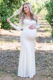 The fitted bodice is accented with crochet lace, while the chiffon skirt flows outward for gorgeous movement while dancing. Wedding Dresses Sexy Mama Maternity