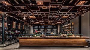 Starbucks Is Opening A Massive Immersive Coffee Experience With A Cocktail Bar In Chelsea 6sqft Starbucks Reserve Coffee Shops Interior Coffee Shop Bar