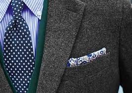 Form a square by folding up the bottom. How To Fold A Pocket Square Or Handkerchief For A Suit Jacket Charles Tyrwhitt