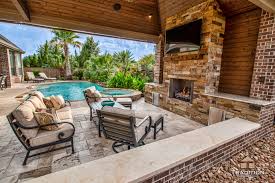 Sep 06, 2019 · an outdoor kitchen can turn your backyard into party central and increase your home's value. Cinco Ranch Covered Patio With Fireplace And Outdoor Kitchen Katy Tx Rustic Patio Houston By Tradition Outdoor Living Houzz