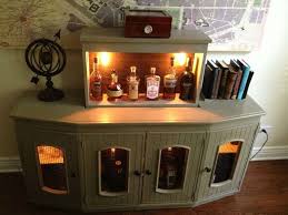 Here's a few sources for prefab cabinets and bookshelves: How To Build A Diy Bar Cabinet