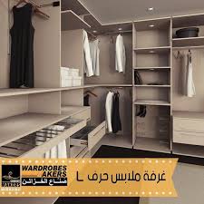 غرفة تبديل الملابس الحديثة على شكل حرف L مع مزيج ناجح من الارفف العلاقات الادراج والسلال والاكسسوارات ال Dekor Spalen V Kvartirah Roskoshnyj Shkaf Hodyachij Shkaf