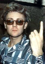 Barry Mitchell(former bassist of Queen) provided this anecdote about what  was being discussed in the dressing room during their...