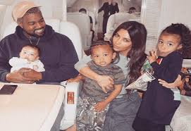 Kim kardashian and kanye west pose with their children, saint west, psalm west, north west, and chicago west. Cdoim 3gjmyxxm