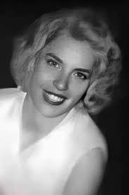 My sister in 1956. I wish it was a color photo!