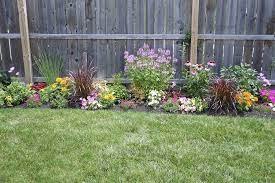 Flower Garden Along Fence Backyard Garden Layout Small Backyard Landscaping Backyard Landscaping Designs