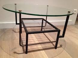The rolf glass top coffee table combines style and modern simplicity. French Black Lacquered Metal And Brass Small Coffee Table With Round Glass Top In The Style Of Mathieu Mategot 1970s For Sale At Pamono