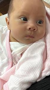 Is purple crying normal in 8 week old baby?