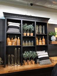 Custom built in shelves alongside existing fireplace. We Recently Visited Chip Joanna Gaines Magnolia Market Silos Store In Waco Tx This Is What We Think Home Stratosphere