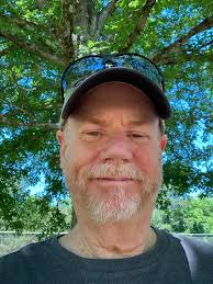 Decorated cotton branches ￼ in a galvanized metal milk can ￼