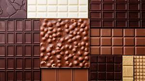 Sugar, chocolate liquor, cocoa butter (some packages also state vanilla). Lazar S Chocolate
