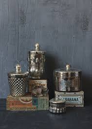 Clear glass square ribbed jars with metal lids, 4x4x4.25 in., square lattice clear glass jars with metal fill it with things like small office stationary, dry kitchen goods like spices, decorative sand or stones, water, and much more. Creative Co Op Chateau Round Mercury Glass Decorative Container With Lid Mercury Glass Canisters Glass Containers With Lids Mercury Glass