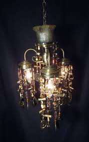Pin By Boo Bearcat On Let There Be Light Chandelier Bottle Lights Light