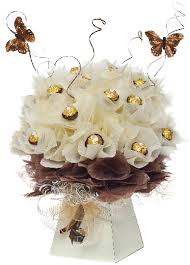 I told her how flowers were a yesterday thing and if she wanted sweets she had a big hunk of man candy right in front of her. Coco Deluxe Chocolate Bouquet Chocolate Flowers Bouquet Candy Flowers Candy Crafts