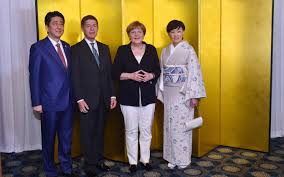 Angela merkel pictured with her husband joachim sauer (image: Rare Sighting Of Angela Merkel S Publicity Shy Husband At G7 Summit