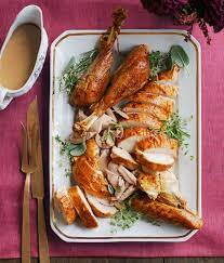 Garlic And Herb Roasted Turkey Recipe Herb Roasted Turkey Best Thanksgiving Turkey Recipe Turkey Recipes