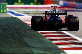 On Road Mclaren Formula One Car 4k Wallpaper Car Mclaren Formula One