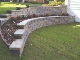 When designing your retaining wall, be sure you take into consideration the height of the wall, wall setback, slopes and surcharges. Retaining Wall Design Construction Wallis Landscape Sloped Backyard Landscaping Landscaping Retaining Walls Backyard Retaining Walls