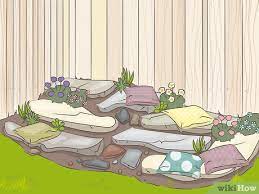 The crevices between the rocks are planted with bulbs, delicate alpine plants and small ground covers on flat ground, a rockery provides a sense of visual relief but care is needed to blend it into the garden. How To Design A Rock Garden 9 Steps With Pictures Wikihow