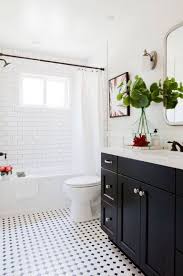 It gets old and dull seeing the same flooring. 101 Stunning Farmhouse Bathroom Tile Floor Decor Ideas And Remodel To Inspire Your Bathroo White Bathroom Designs Bathroom Tile Designs Black Cabinets Bathroom