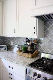 We loved the shade of the gray in this grey shaker kitchen cabinet! Pin By Rachael Gastelum On Kitchen Kitchen Design White Kitchen Backsplash White Kitchen Design
