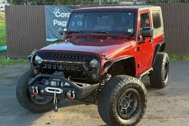 Image result for Flame Red 2009 Jeep