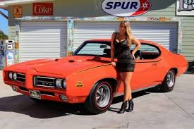 Making you dance with the greatest hits from the '50s, '60s and '70s. 1969 Pontiac Gto The Judge 400 Ram Air Iii And Girl Girls And Cars Cars Background Wallpapers On Desktop Nexus Image 2296985