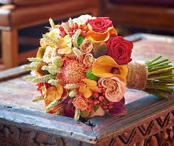 Typical fall wedding decorations are apples, pumpkins, foliage, seasonal flowers, etc. 6 Wedding Flower Ideas For The Autumn Bride Interflora