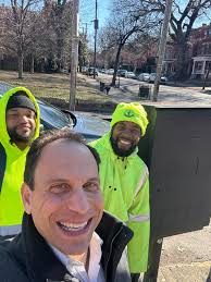 Who should be contacted to remove graffiti near the 911 Memorial in Belen?