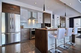 Modern And Contemporary Kitchen With Stainless Appliances And Gorgeous Slee Kitchen Remodel Layout Kitchen Interior Design Modern Interior Design Kitchen Small