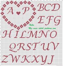 Stamped pillowcases and dresser scarves for cross stitch and hand embroidery. Ring Pillows Shamrocks And Initial Cross Stitch Pattern Free Cross Stitch Patterns Simple Unique Alphabets Baby