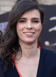 Make it a real fansite. Category Nora Tschirner Wikimedia Commons