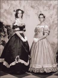 During the early 1860s, younger women often styled their hair in long crimps and waves. Lavender S Green Civil War Fashion Reenactors Mid 19th Century Victorian Dresses Costumes Pioneer Old West Historically Accurate