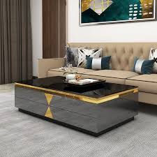 Before investing in any large coffee tables with storage, you need to measure length and width of the interior. Rasay Black Large Storage Coffee Table With 4 Drawers Modern Rectangular Coffee Table With Gold Accent