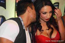 Actor Ajaz Khan talking to adult star Shanti Dynamite at the first look  launch of the movie I Love Dubai | STARFRIDAY