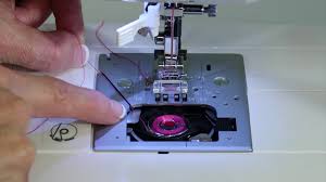 To clean the bobbin they recommend a few drops of cleaner on a clean rag and wipe the bobbin down with that. Singer Confidence 7463 6 Inserting The Bobbin Youtube