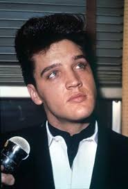 Elvis with that timeless stare, where charm meets mystery