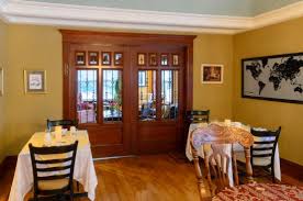 An old back porch transformed to an all season dining room. Beautiful Pocket French Doors Separating Lounge Area From Dining Area Picture Of Ecologe Cantley Tripadvisor