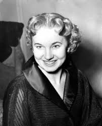 Pictured in London is 20-yar-old Ingrid Rita Mills , blue-eyed blonde  shorthand-typist from